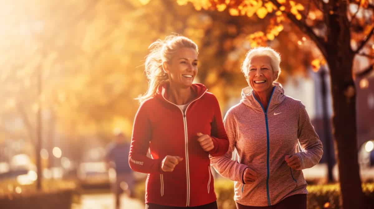 Active senior women jogging outdoors in autumn, healthy lifestyle, fitness training, autumn scenery, well-being, Consilium Asset Management.